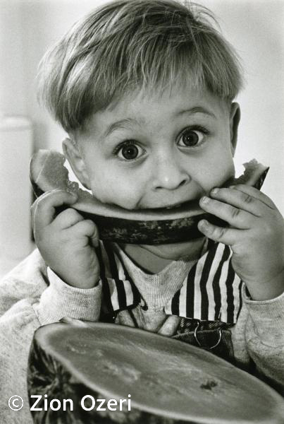 New immigrant's First Watermelon. 